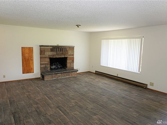 Fireplace has new electric insert & blower.