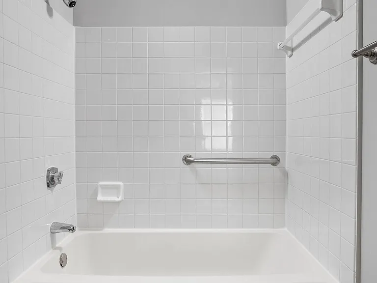 Bath tub with modern tile