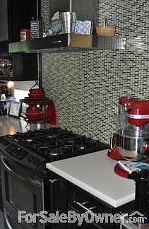 3 BR Ranch on the River Raisin
						:
						Beautifuly landscaped ranch with a chefs kitchen and heated tile floors.