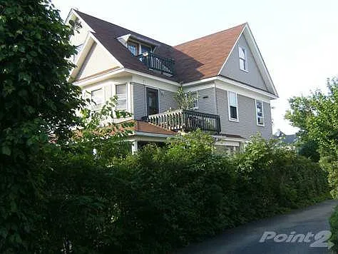 2-Side view of house and balconies