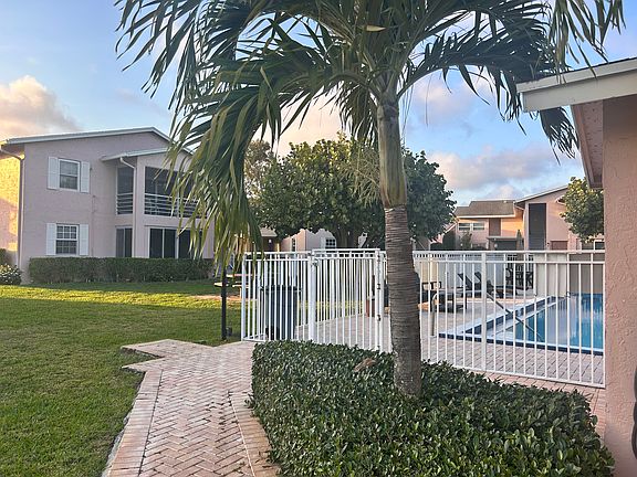 Beautiful gated pool w public bathroom right outside your door.