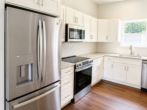 Bright modern kitchen with stainless steel appliances