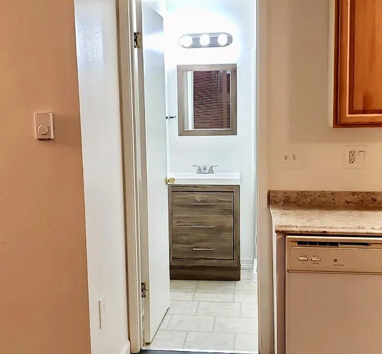 Bath off the kitchen.