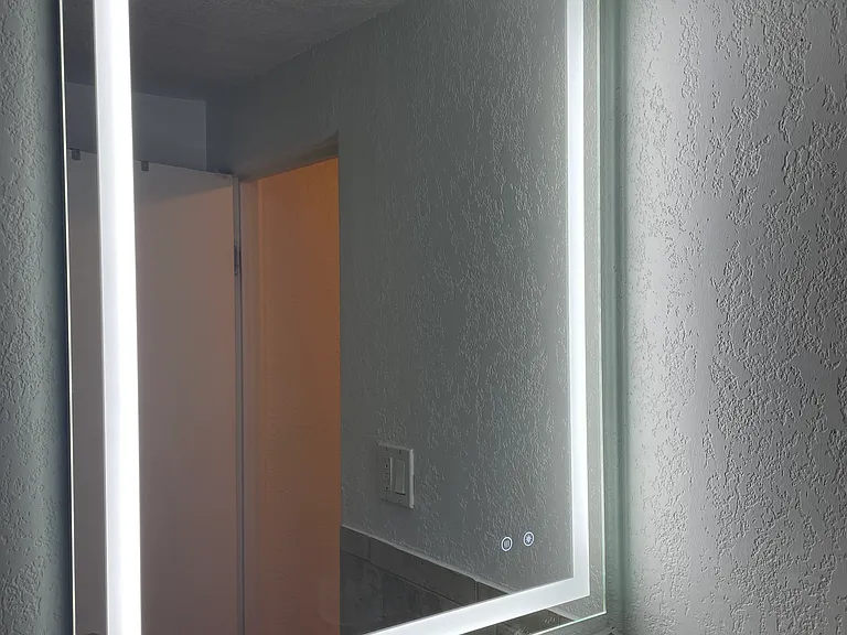 bathroom with LED light mirror