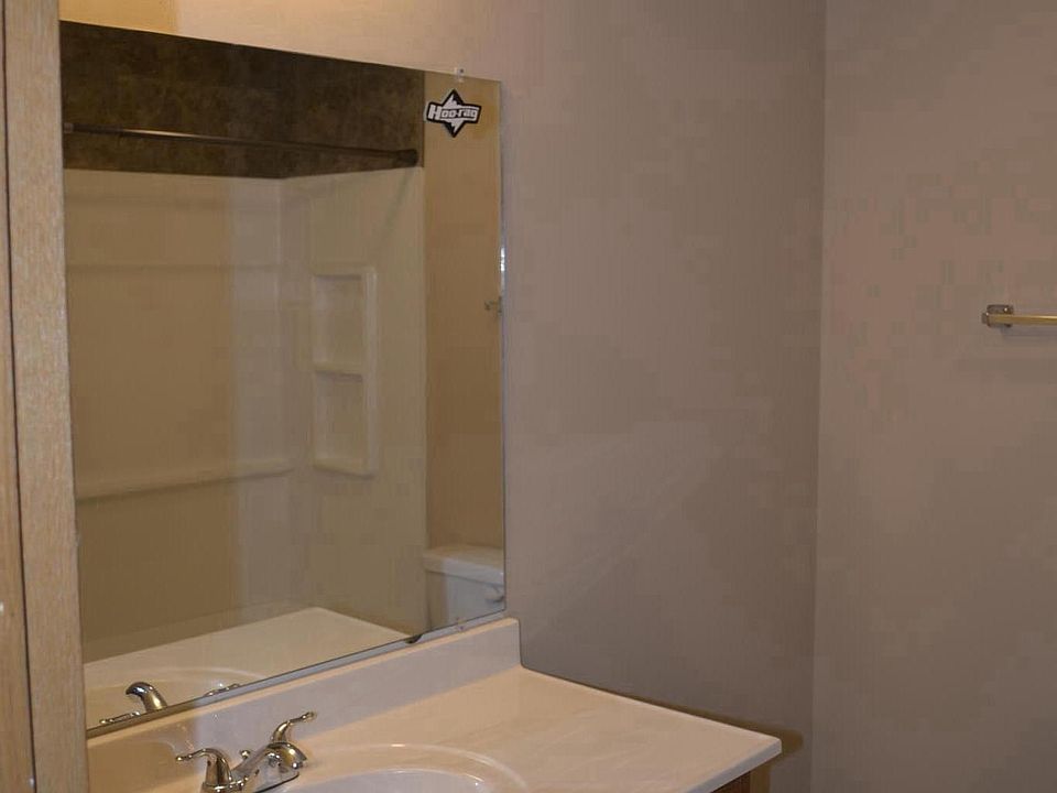 Lower Level Bath with full tub/shower and tiled floors. 