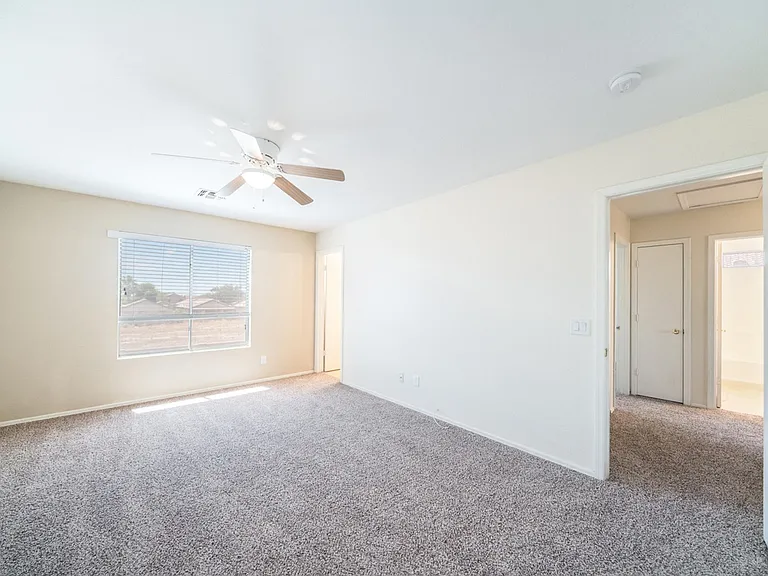 Primary bedroom and hall