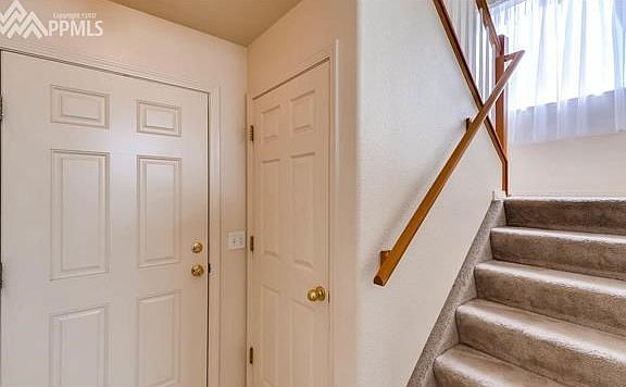 The entry with a nice, wide staircase