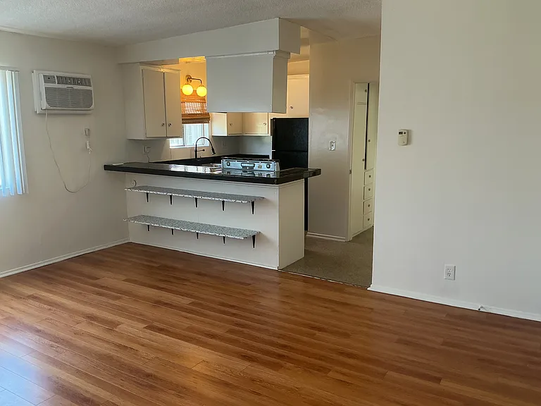 View of kitchen from living room