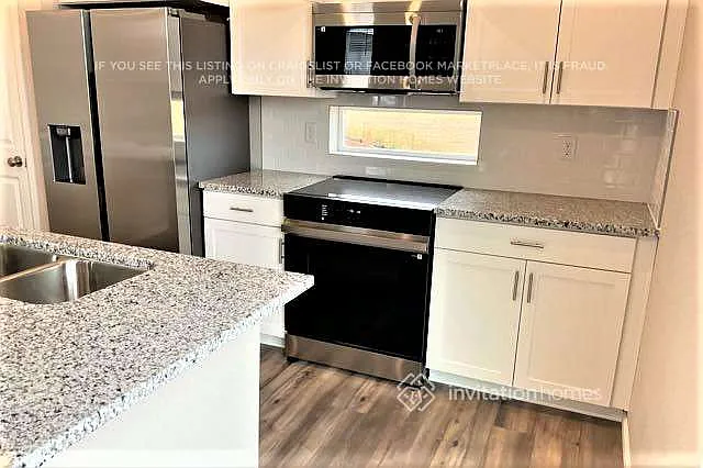 9985 Revere Ct Commerce City, CO 80022 — Photo 4