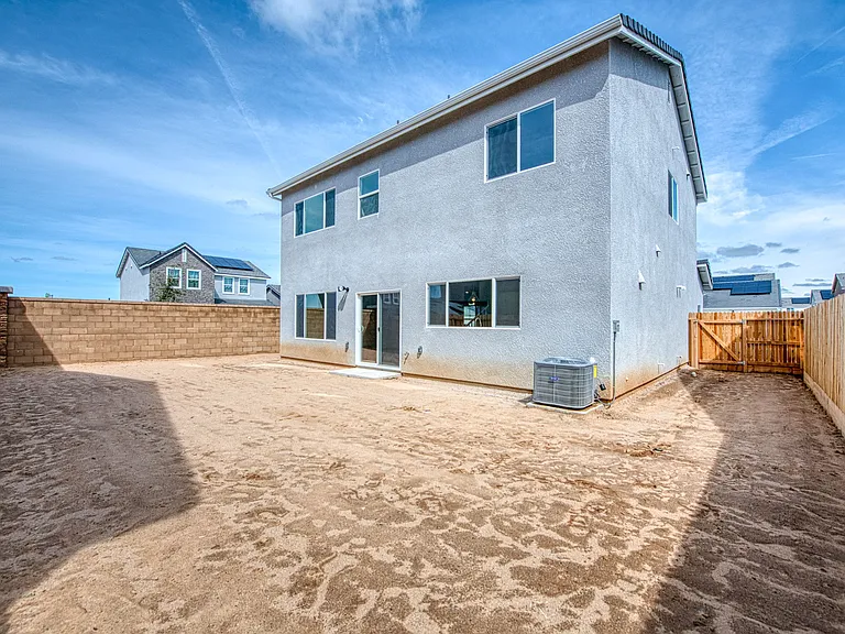 Back yard - will be adding covered patio structure and grass/landscaping. Current landscape photo coming soon