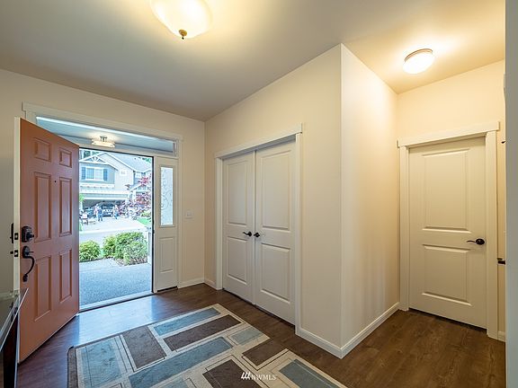 Formal entry with French doors into office