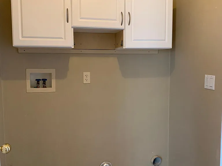 Separate laundry room on ground floor.