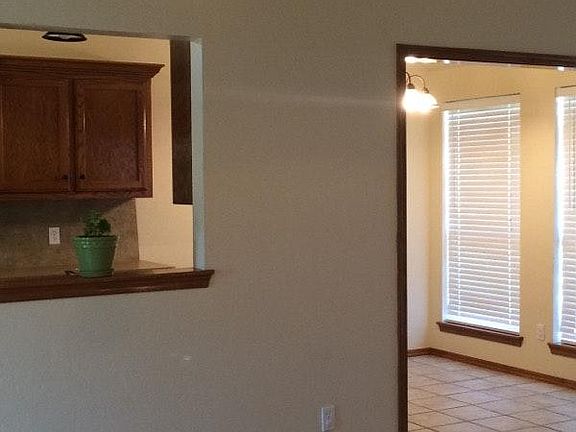 Living Room view into Kitchen and Dining