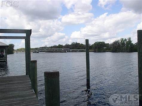 River front to the west - Ft. Denaud bridge