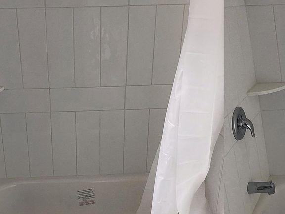 Brand new tub and tiles