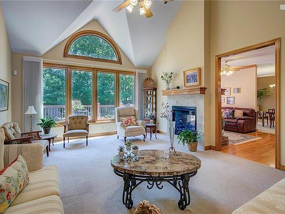 Magnificent open floor plan with floor to ceiling views of your own backyard nature