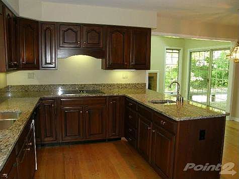 Cherry cabintes & new stainless steel appliances