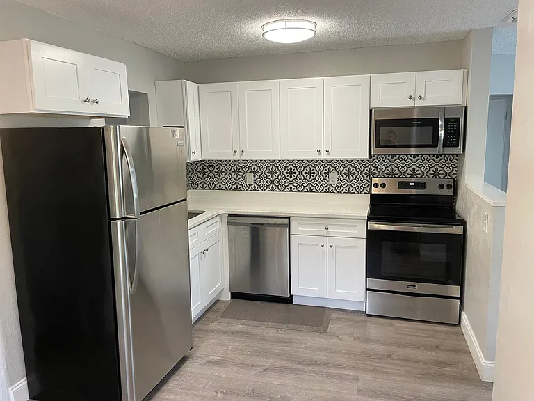 Kitchen with stainless steel appliances