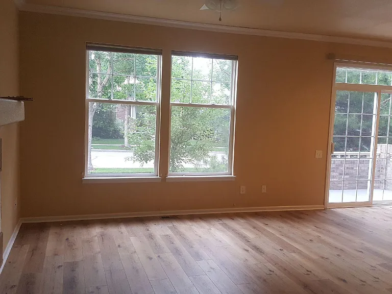 Great room also has top/down bottom/up shades in large sunny yet private windows. Gas fireplace will warm the heart and the body when wanted