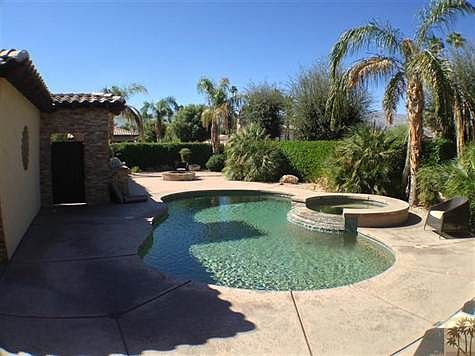 Large side yard with pool, spa, built-in barbeque and firepi