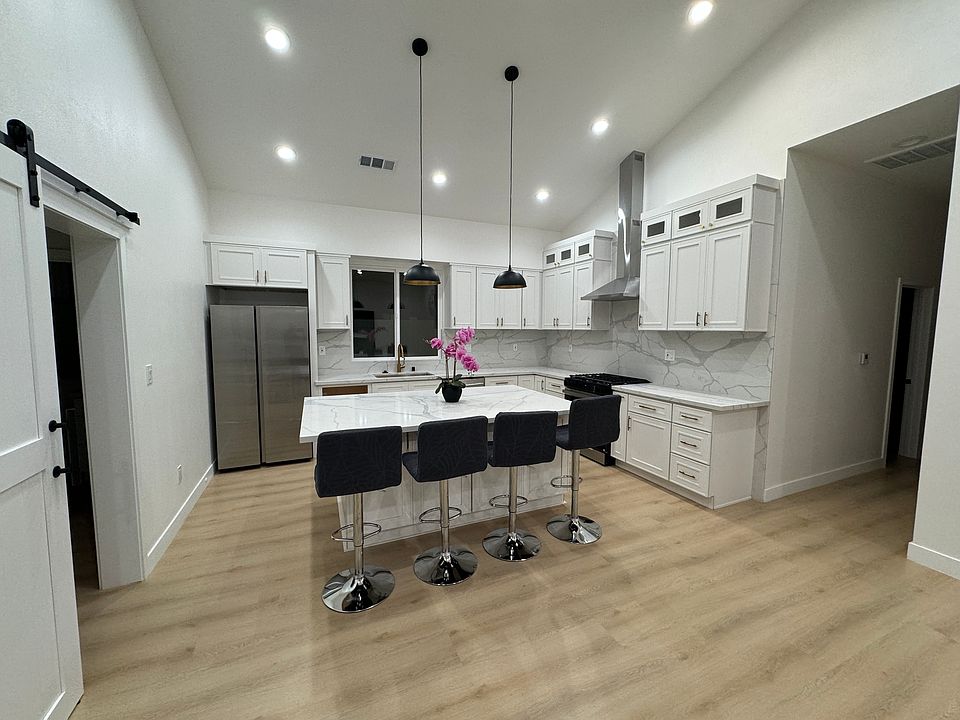Kitchen with vaulted ceilings
