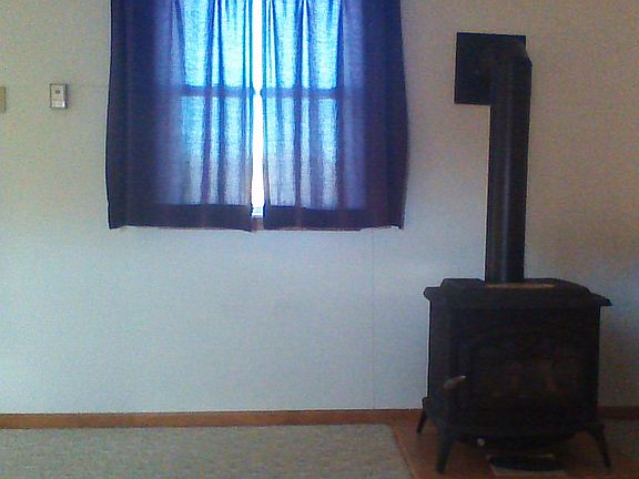 Natural gas logs stove