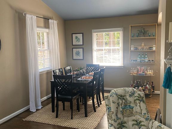 Dinning Room open to kitchen & Living Room with skylights