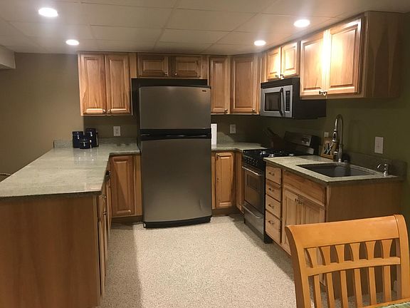 Furnished kitchen with new dishes, glassware, pots & pans, spices and other amenities