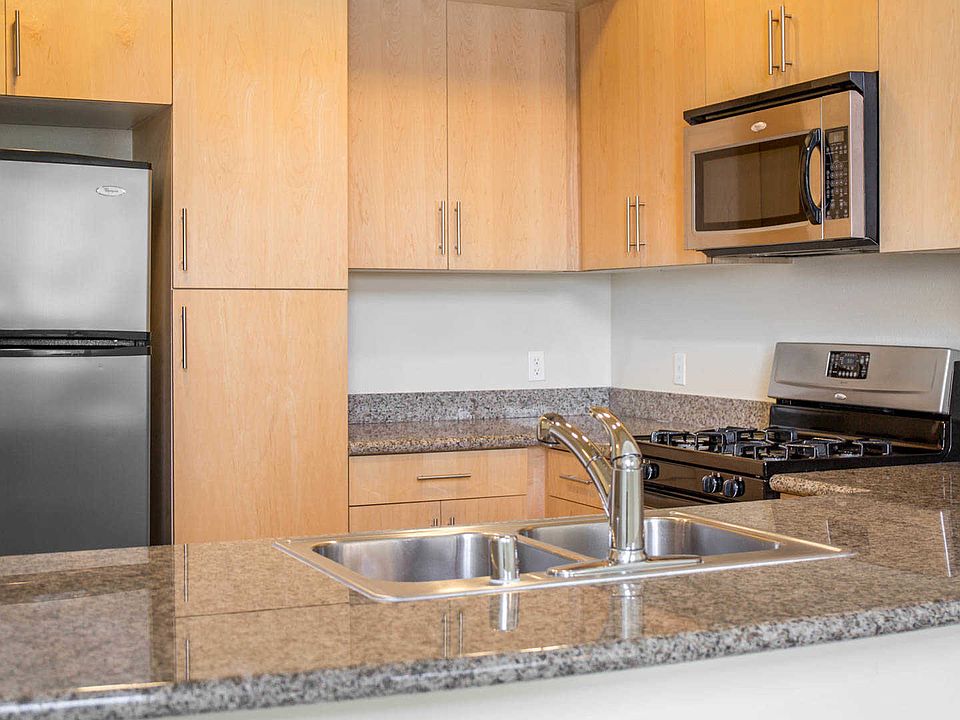 Kitchen with Stainless Steel Appliances and Granite Countertops