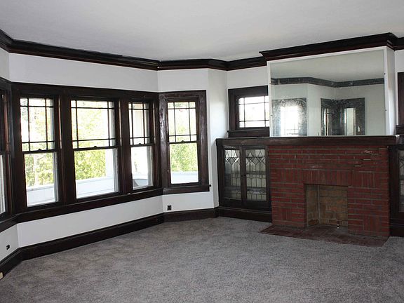 Bright and cheery living room. Brand new carpet throughout.