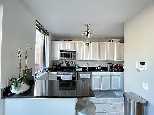 5th image of 160 W 22nd St APT 1101