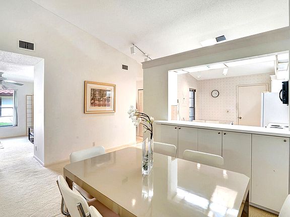 5th image of 10939 Roebelini Palm Court #B