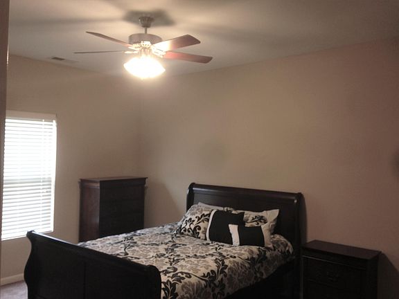 Large Master bedroom and bath with ceiling fans