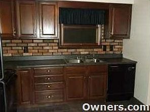 Kitchen with included appliances