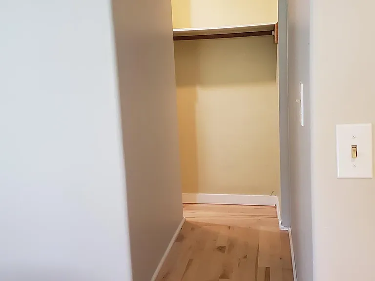 Access to closet. New hardwood maple floors were installed in the bedrooms.
