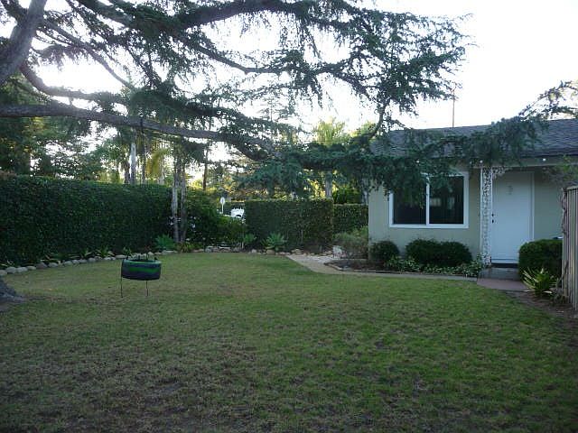 Large yard and cottage.