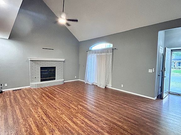 Main living room, fireplace, vaulted ceilings