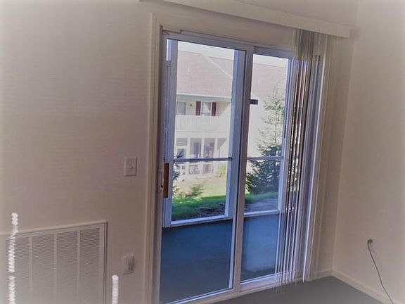 Sliding glass doors to screened porch