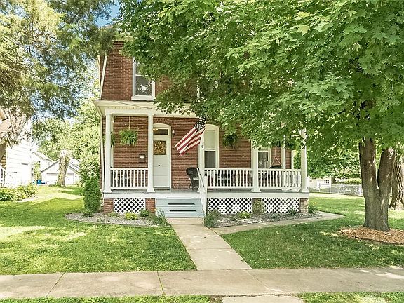 That front porch is tempting.  Don't sit on the swing, or you will never want to leave...  Fetch a lemonade and you  just might be in Heaven.
