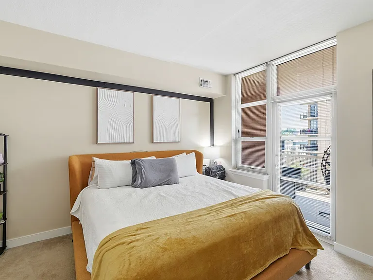 Primary bedroom featuring generous space and excellent natural light
