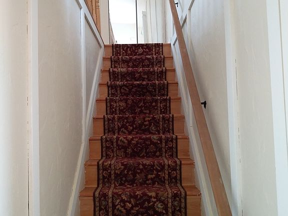 Stairs up from garage