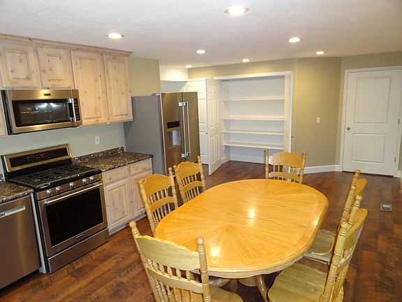 Kitchen showing pantry open
