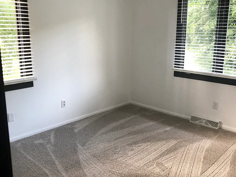 Master bedroom with large closets and connecting bathroom.