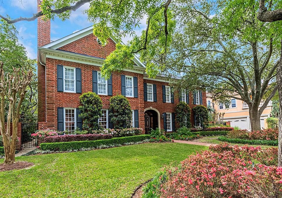 Welcome to your new home that's situated on a lushly landscaped Tanglewood lot.