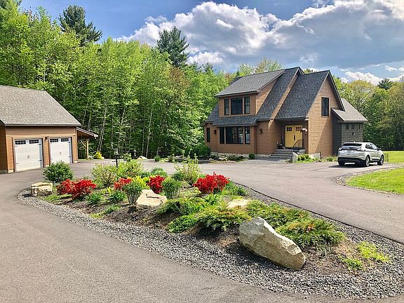 2 car garage with 2 carports