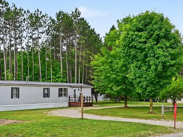 5925 Pine Aire Dr, Grawn, MI 49637