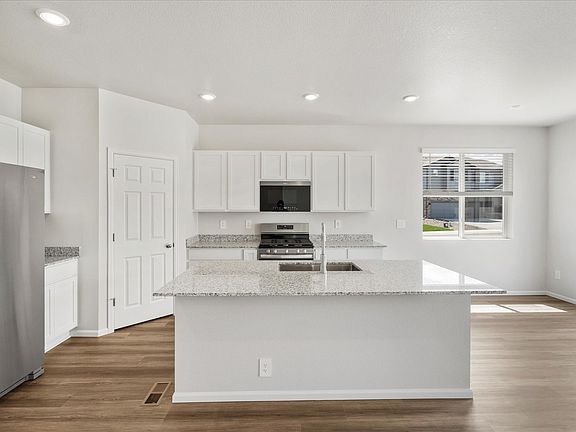 The Blue Mesa floorplan image taken at a Meritage Homes community in Windsor, CO.