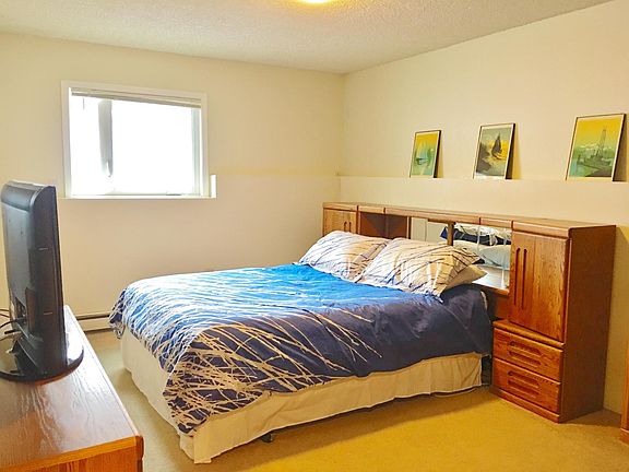 Master Bedroom with Queen Bed 2230 E. 52nd Ave. #3