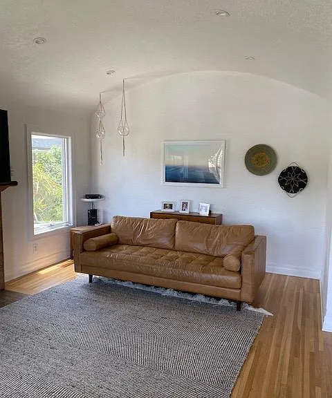 Living room with curved ceilings