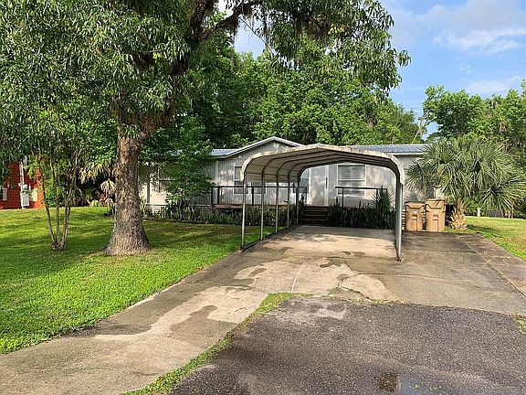 Front drive with carport